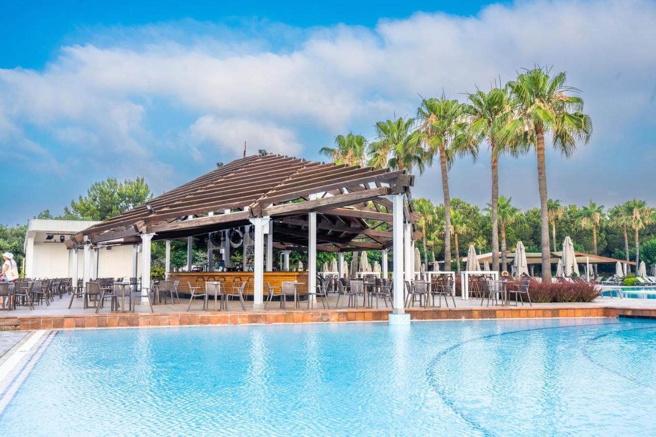 Hotel Lara Barut Collection Antalya Exterior foto The swimming pool at the hotel